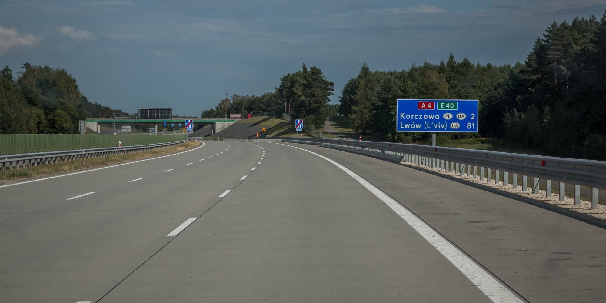 Motorway sign on the Polish A4 counting down 81 km to Lviv at the Ukrainian border